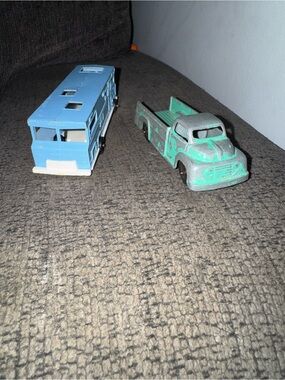 Antique 1970s camper and 1950s pickup truck by tootsietoy